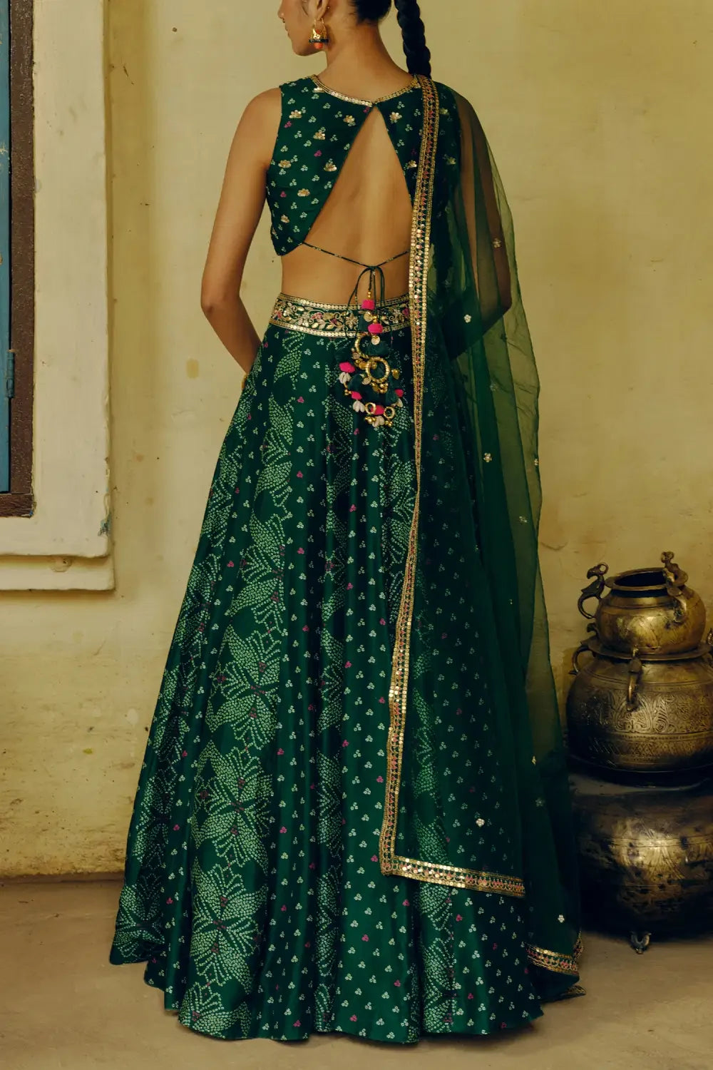 Rent Drishti & Zahabia Emerald green bandhani printed lehenga set