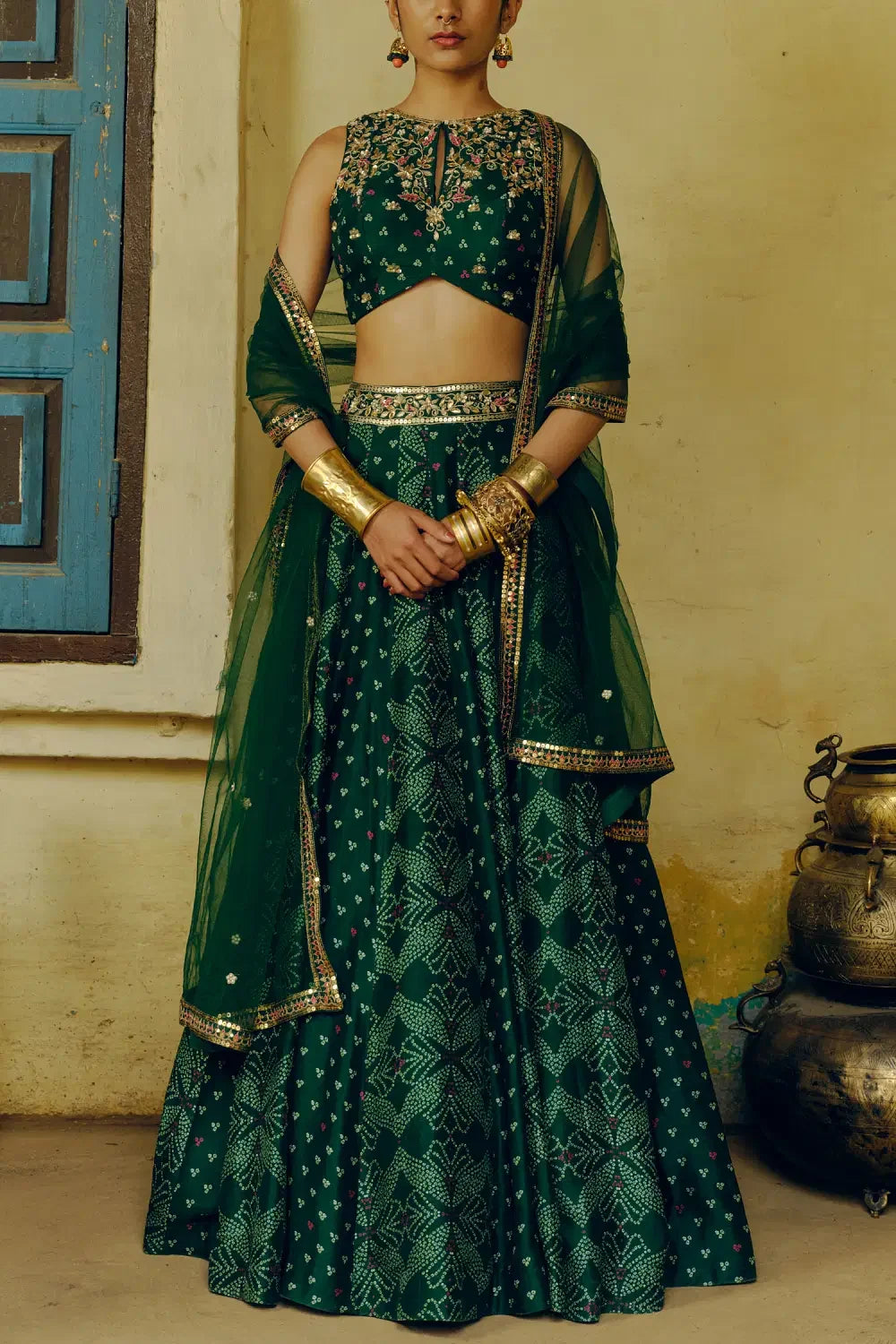 Rent Drishti & Zahabia Emerald green bandhani printed lehenga set