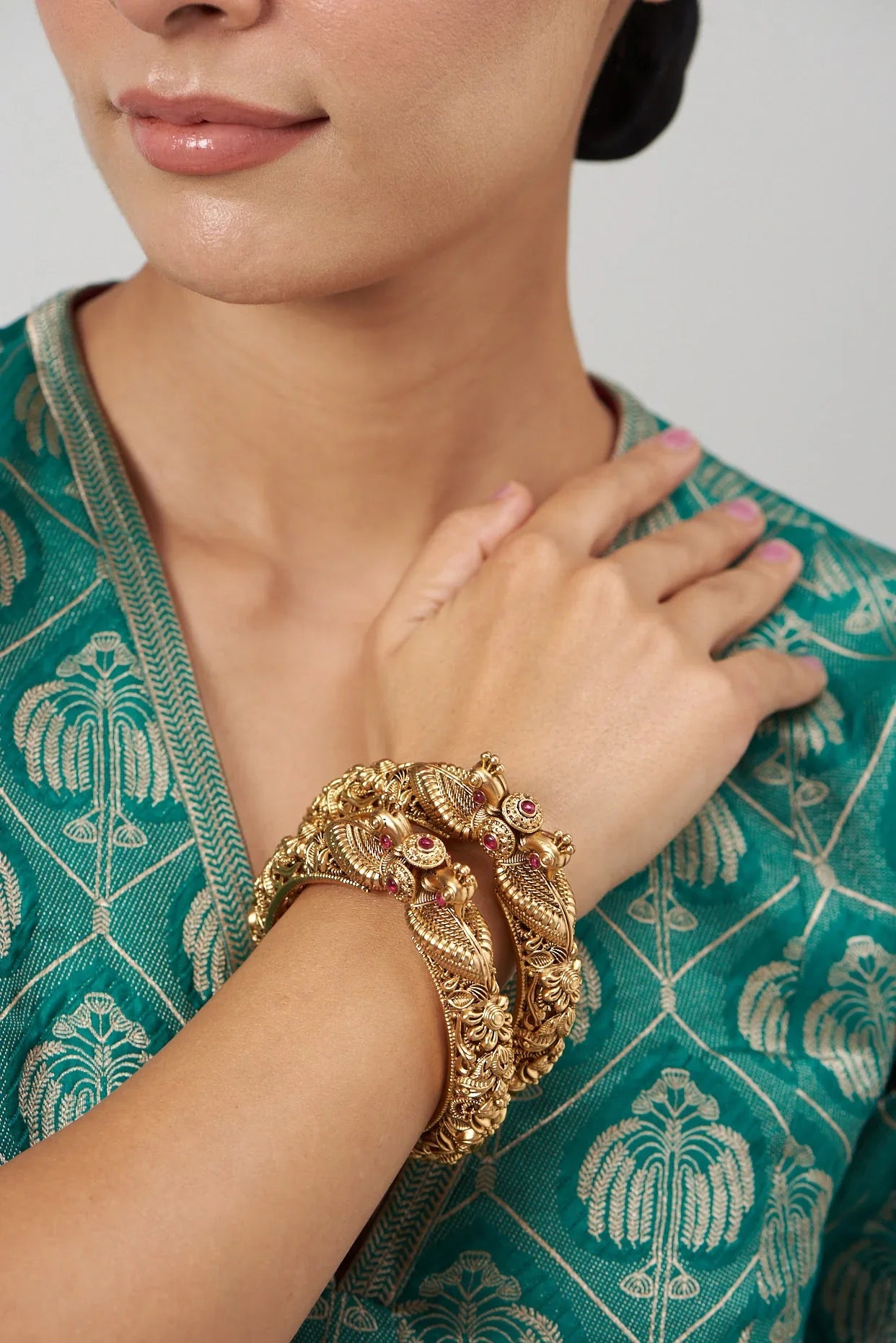 Rent Gold Finish Temple Bangles