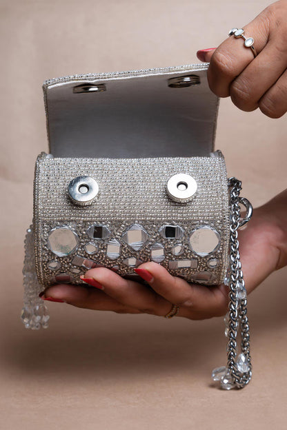 Rent Silver Mirror Work Cylindrical Bag