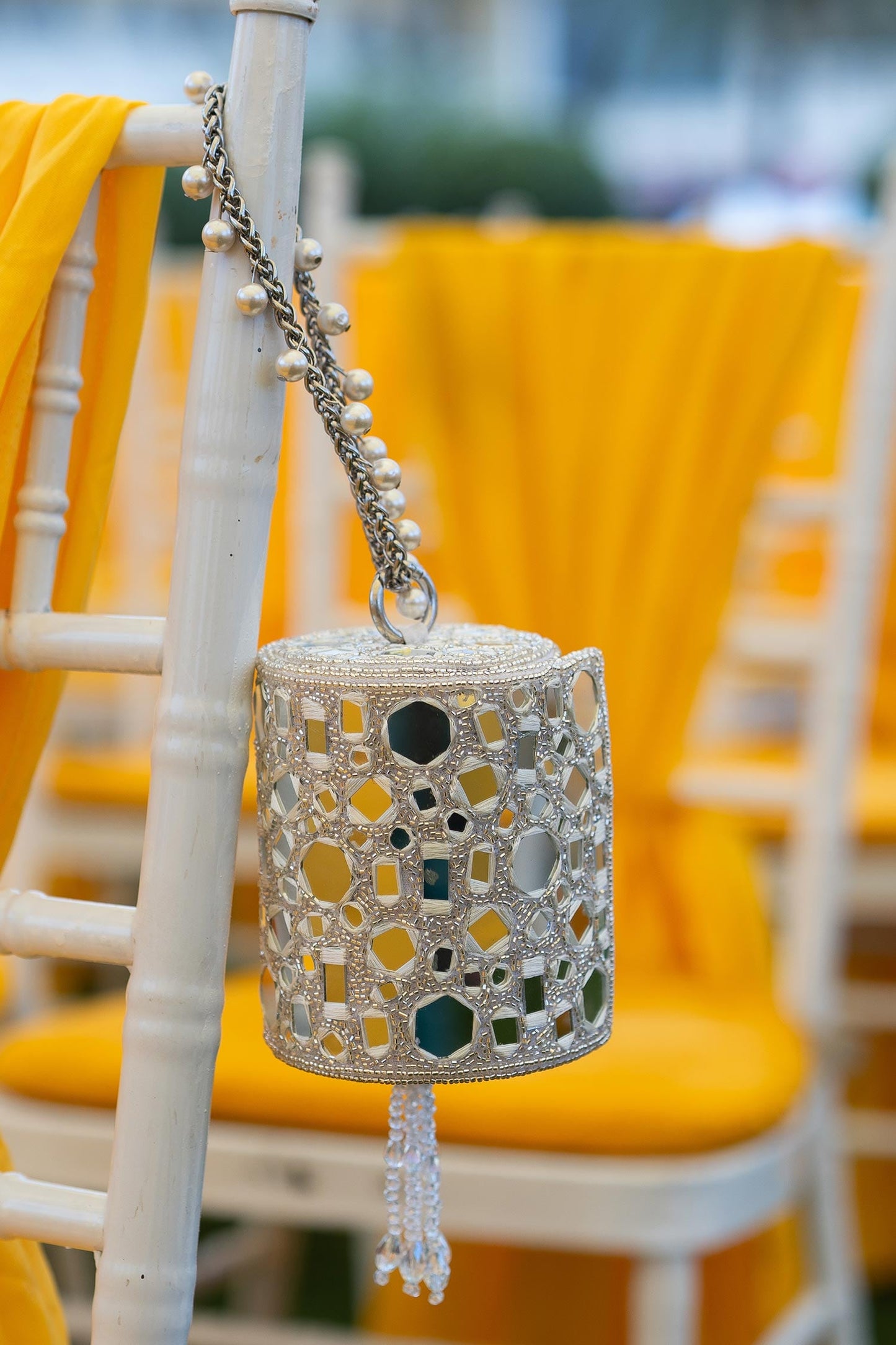 Rent Silver Mirror Work Cylindrical Bag