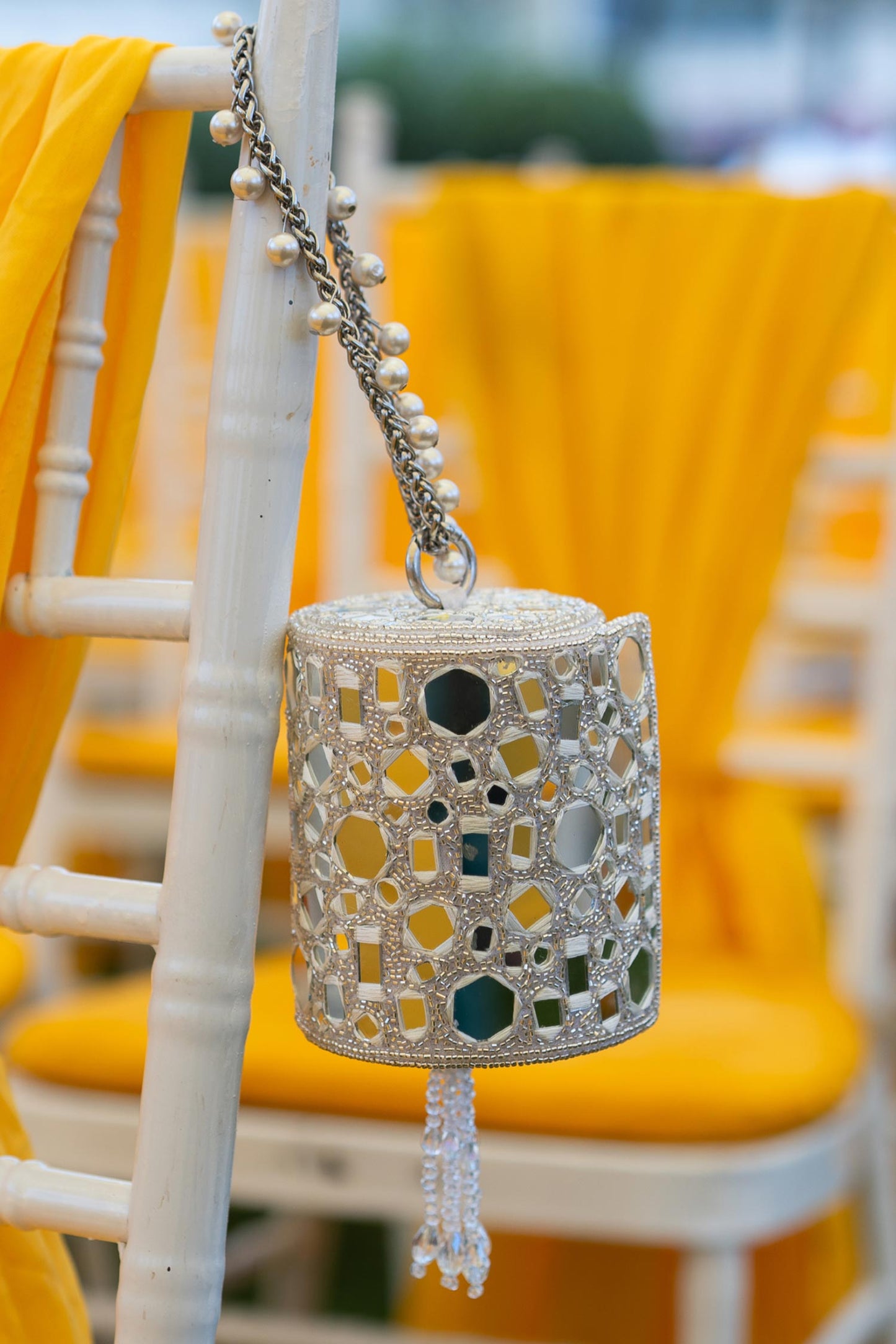 Rent Silver Mirror Work Cylindrical Bag