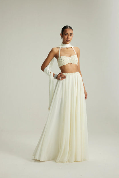 Rent Vani Vats Off White Skirt Set With Halter Neck Blouse