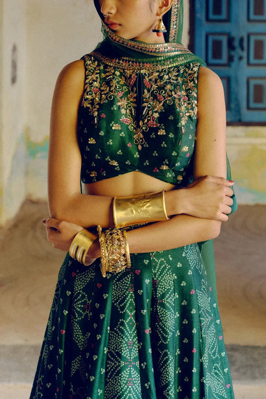 Rent Drishti & Zahabia Emerald green bandhani printed lehenga set