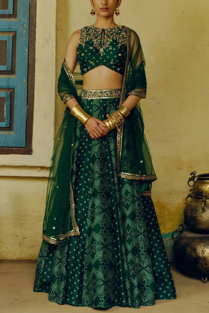 Rent Drishti & Zahabia Emerald green bandhani printed lehenga set