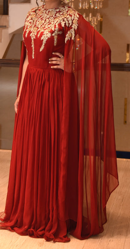 Red Gown with gold detailing on the neck